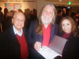 Peace & War Artist, George Gittoes 2014 in the middle of Artist Marcelle Mansour (right) and Maurice Mansour (left)