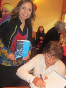 Dr Ghada karmi signing the book